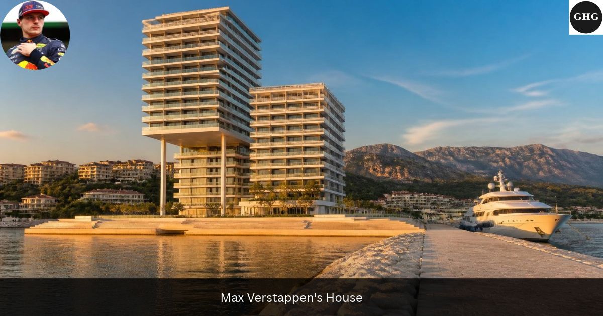 Max Verstappen's House — white terraced residential tower on a stone quay beside a yacht on the Mediterranean at golden hour
